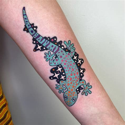 lizard tattoo|Lizard Tattoo Meaning: Personal Stories and。